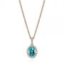14k Rose Gold 14k Rose Gold Oval Blue Zircon And Diamond Halo Pendant - Three-Quarter View -  105339 - Thumbnail