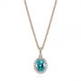 14k Rose Gold 14k Rose Gold Oval Blue Zircon And Diamond Halo Pendant - Three-Quarter View -  105339 - Thumbnail