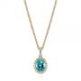 14k Yellow Gold 14k Yellow Gold Oval Blue Zircon And Diamond Halo Pendant - Three-Quarter View -  105339 - Thumbnail
