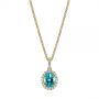 14k Yellow Gold 14k Yellow Gold Oval Blue Zircon And Diamond Halo Pendant - Three-Quarter View -  105339 - Thumbnail