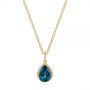 14k Yellow Gold 14k Yellow Gold Pear Shaped London Blue Topaz And Diamond Pendant - Three-Quarter View -  104996 - Thumbnail