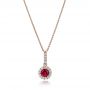 14k Rose Gold 14k Rose Gold Ruby And Diamond Halo Pendant - Three-Quarter View -  100970 - Thumbnail