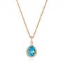 14k Rose Gold 14k Rose Gold Teardrop Blue Topaz And Diamond Halo Pendant - Three-Quarter View -  103773 - Thumbnail