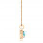 14k Rose Gold 14k Rose Gold Teardrop Blue Topaz And Diamond Halo Pendant - Side View -  103773 - Thumbnail