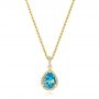 14k Yellow Gold 14k Yellow Gold Teardrop Blue Topaz And Diamond Halo Pendant - Three-Quarter View -  103773 - Thumbnail