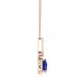 14k Rose Gold 14k Rose Gold Trillion Tanzanite And Diamond Halo Pendant - Side View -  105003 - Thumbnail