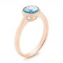 18k Rose Gold 18k Rose Gold Bezel-set Blue Topaz Ring - Three-Quarter View -  104577 - Thumbnail