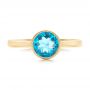 14k Yellow Gold 14k Yellow Gold Bezel-set Blue Topaz Ring - Top View -  104577 - Thumbnail