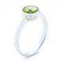  Platinum Platinum Bezel Set Peridot Ring - Three-Quarter View -  102636 - Thumbnail