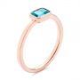 18k Rose Gold 18k Rose Gold Blue Topaz Emerald Cut Fashion Ring - Three-Quarter View -  105436 - Thumbnail