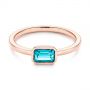 14k Rose Gold 14k Rose Gold Blue Topaz Emerald Cut Fashion Ring - Flat View -  105436 - Thumbnail