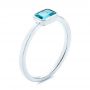 14k White Gold Blue Topaz Emerald Cut Fashion Ring - Three-Quarter View -  105436 - Thumbnail