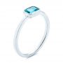 14k White Gold Blue Topaz Emerald Cut Fashion Ring - Three-Quarter View -  105436 - Thumbnail
