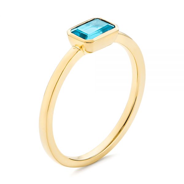 14k Yellow Gold 14k Yellow Gold Blue Topaz Emerald Cut Fashion Ring - Three-Quarter View - 105436