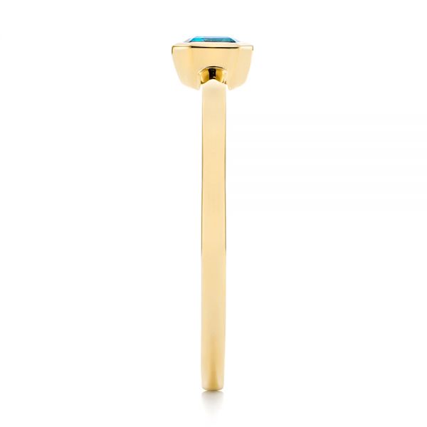 14k Yellow Gold 14k Yellow Gold Blue Topaz Emerald Cut Fashion Ring - Side View - 105436