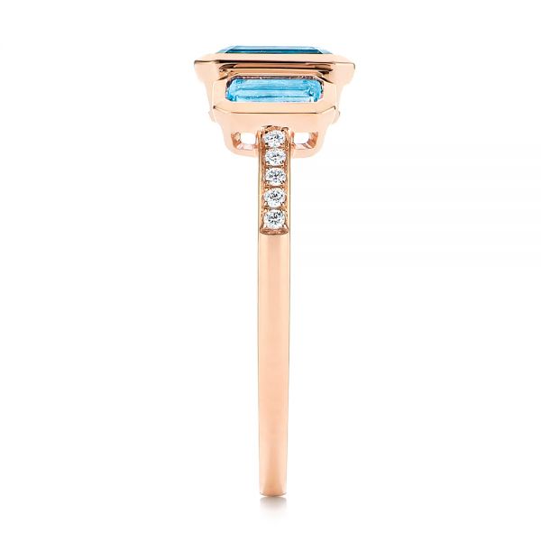 14k Rose Gold 14k Rose Gold Emerald Cut Blue Topaz And Diamond Three-stone Ring - Side View - 106024