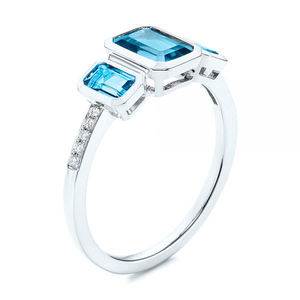 18k White Gold 18k White Gold Emerald Cut Blue Topaz And Diamond Three-stone Ring - Three-Quarter View -  106024