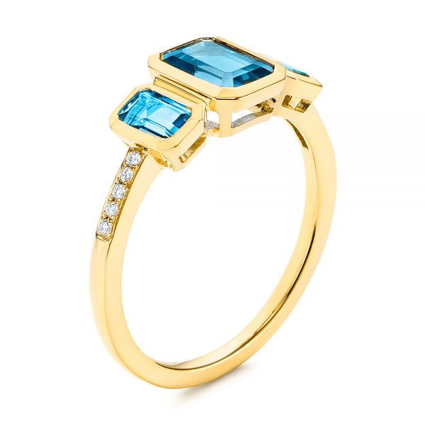 18k Yellow Gold 18k Yellow Gold Emerald Cut Blue Topaz And Diamond Three-stone Ring - Three-Quarter View -  106024