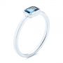  Platinum Platinum Emerald Cut London Blue Topaz Fashion Ring - Three-Quarter View -  105407 - Thumbnail