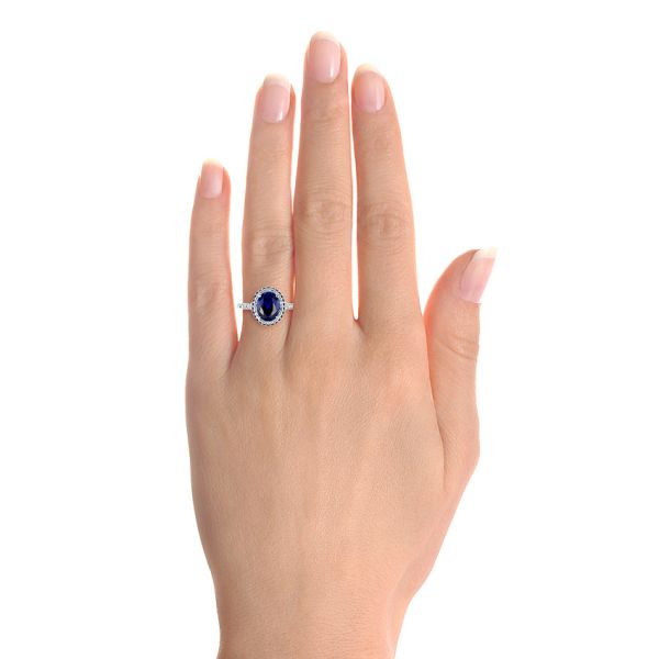 14k White Gold Custom Blue Sapphire And Diamond Halo Engagement Ring - Hand View - 103041