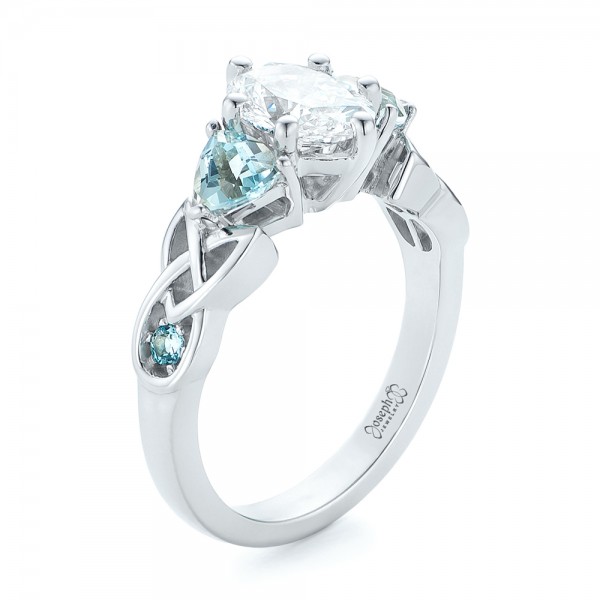 wedding ring blue topaz and diamonds