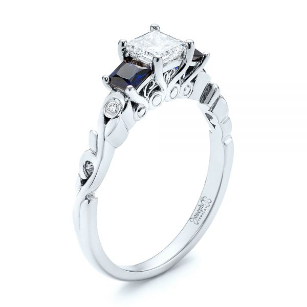 18k White Gold 18k White Gold Custom Three Stone Blue Sapphire And Diamond Engagement Ring - Three-Quarter View -  103146