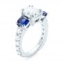 18k White Gold 18k White Gold Custom Three Stone Blue Sapphire And Diamond Engagement Ring - Three-Quarter View -  102972 - Thumbnail