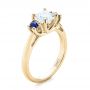 14k Yellow Gold 14k Yellow Gold Custom Three Stone Blue Sapphire And Diamond Engagement Ring - Three-Quarter View -  103484 - Thumbnail