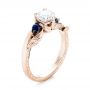 18k Rose Gold 18k Rose Gold Custom Three Stone Blue Sapphire And Diamond Hand Engraved Engagement Ring - Three-Quarter View -  103488 - Thumbnail