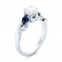  Platinum Platinum Custom Three Stone Blue Sapphire And Diamond Hand Engraved Engagement Ring - Three-Quarter View -  103488 - Thumbnail