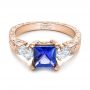 14k Rose Gold 14k Rose Gold Custom Three Stone Tanzanite And Diamond Anniversary Ring - Flat View -  102144 - Thumbnail