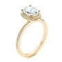 14k Yellow Gold 14k Yellow Gold Oval Diamond Halo Engagement Ring - Three-Quarter View -  105128 - Thumbnail