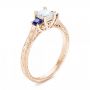 14k Rose Gold 14k Rose Gold Three Stone Blue Sapphire And Diamond Engagement Ring - Three-Quarter View -  102020 - Thumbnail