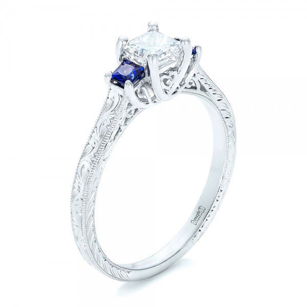 14k White Gold Three Stone Blue Sapphire And Diamond Engagement Ring - Three-Quarter View -  102020