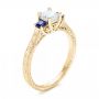 18k Yellow Gold 18k Yellow Gold Three Stone Blue Sapphire And Diamond Engagement Ring - Three-Quarter View -  102020 - Thumbnail