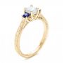 18k Yellow Gold 18k Yellow Gold Three Stone Blue Sapphire And Diamond Engagement Ring - Three-Quarter View -  102020 - Thumbnail