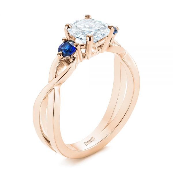 14k Rose Gold 14k Rose Gold Three Stone Blue Sapphire And Moissanite Engagement Ring - Three-Quarter View -  105201