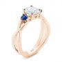 18k Rose Gold 18k Rose Gold Three Stone Blue Sapphire And Moissanite Engagement Ring - Three-Quarter View -  105201 - Thumbnail