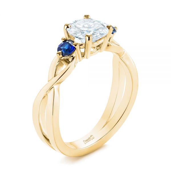 18k Yellow Gold 18k Yellow Gold Three Stone Blue Sapphire And Moissanite Engagement Ring - Three-Quarter View -  105201