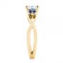 14k Yellow Gold 14k Yellow Gold Three Stone Blue Sapphire And Moissanite Engagement Ring - Side View -  105201 - Thumbnail