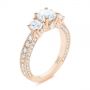18k Rose Gold 18k Rose Gold Three Stone Oval And Round Diamond Engagement Ring - Three-Quarter View -  104871 - Thumbnail