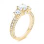 14k Yellow Gold 14k Yellow Gold Three Stone Oval And Round Diamond Engagement Ring - Three-Quarter View -  104871 - Thumbnail