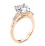 14k Rose Gold 14k Rose Gold Three Stone Pear And Tapered Baguette Diamond Engagement Ring - Three-Quarter View -  107807 - Thumbnail