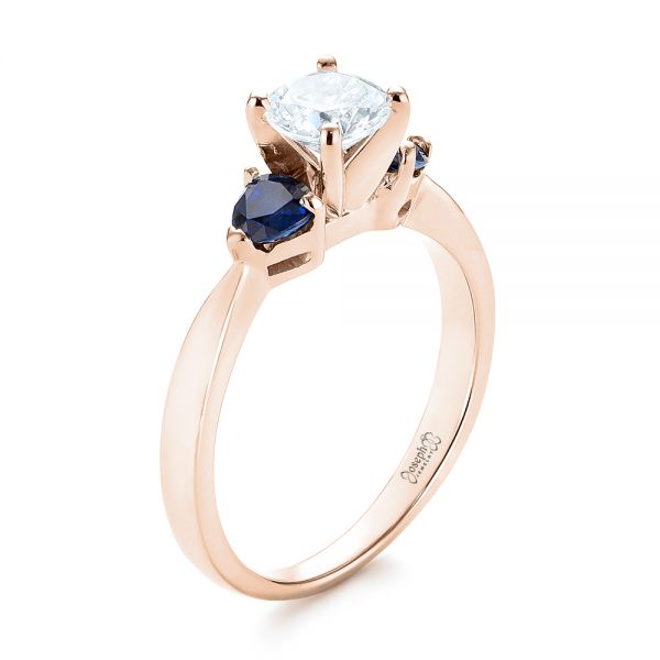 18k Rose Gold 18k Rose Gold Three Stone Trillion Blue Sapphire And Diamond Engagement Ring - Three-Quarter View -  100317