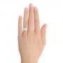 14k White Gold 14k White Gold Trellis Three Stone Engagement Ring - Hand View -  107308 - Thumbnail