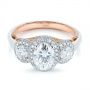 Platinum And 18k Rose Gold Platinum And 18k Rose Gold Two-tone Three Stone Diamond Halo Engagement Ring - Flat View -  104860 - Thumbnail