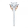  Platinum And 18k Rose Gold Platinum And 18k Rose Gold Two-tone Three Stone Diamond Halo Engagement Ring - Side View -  104860 - Thumbnail