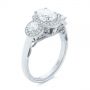  18K Gold And Platinum 18K Gold And Platinum Two-tone Three Stone Diamond Halo Engagement Ring - Three-Quarter View -  104860 - Thumbnail
