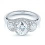  Platinum And 18k White Gold Platinum And 18k White Gold Two-tone Three Stone Diamond Halo Engagement Ring - Flat View -  104860 - Thumbnail