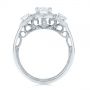  Platinum And 18k White Gold Platinum And 18k White Gold Two-tone Three Stone Diamond Halo Engagement Ring - Front View -  104860 - Thumbnail